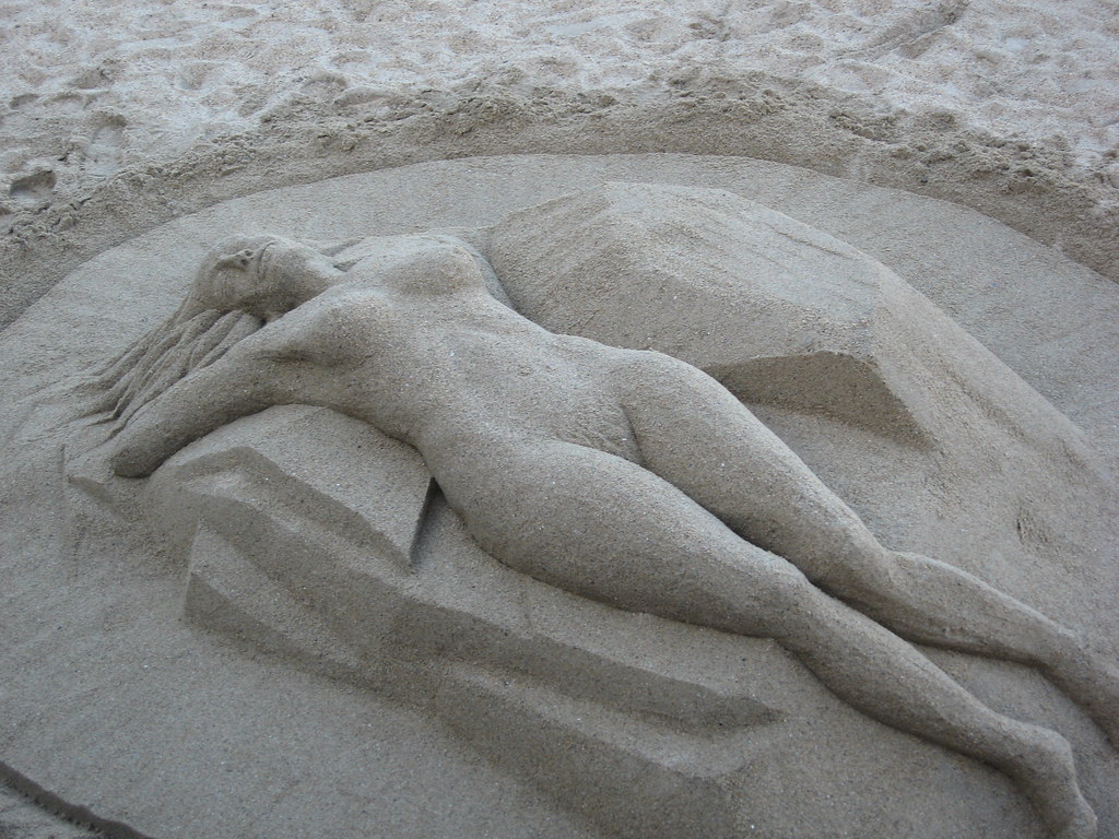 alex russu recommends nude woman beach pic