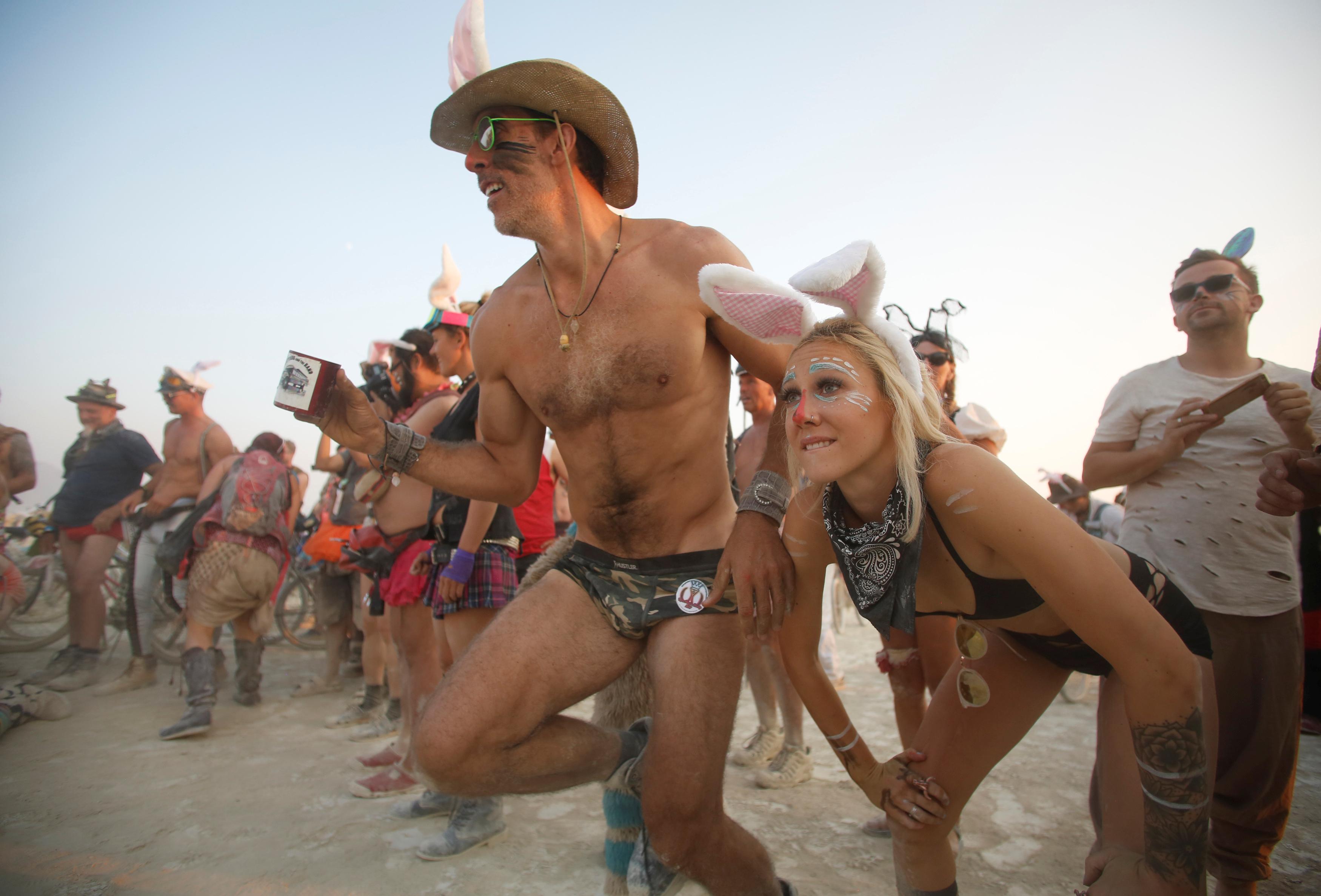 burning man blowjob blonde face burning man blowjob